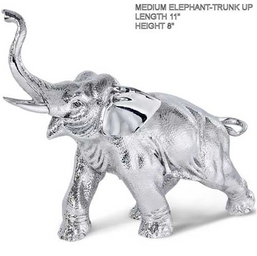 medium hallmarked silver elephant with trunk pointing upwards