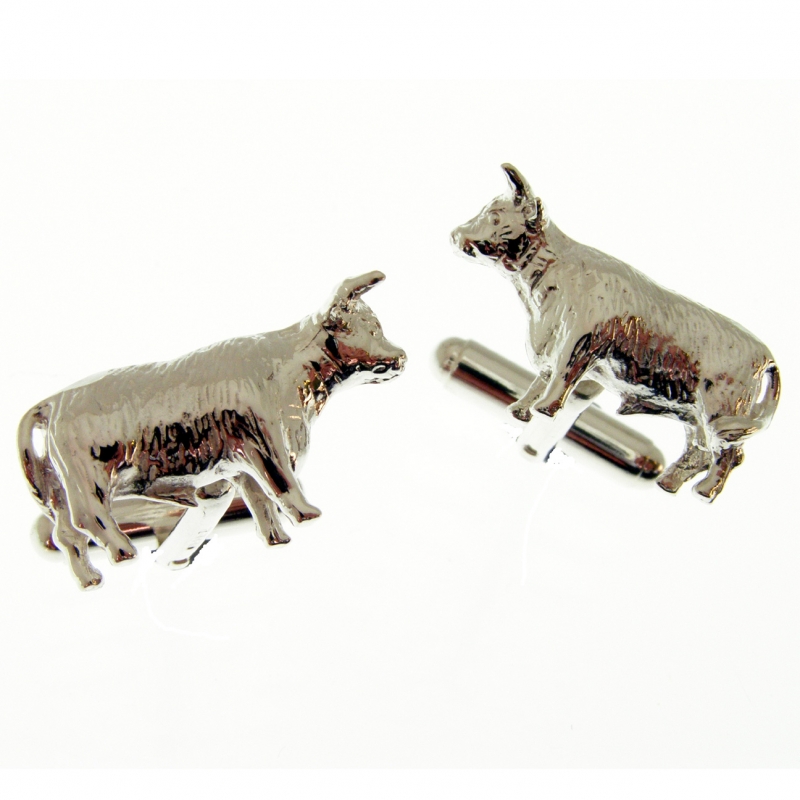 silver cufflinks with a pedigree bull theme