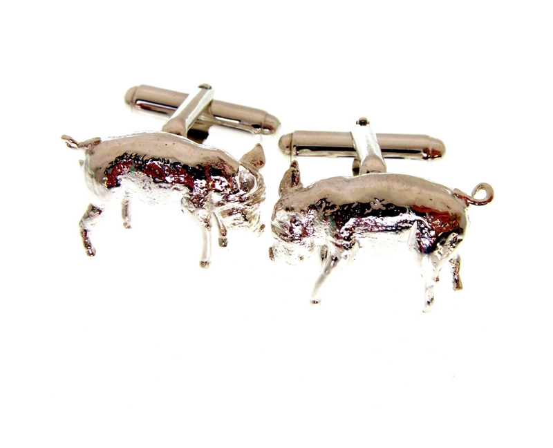 silver cufflinks have swivel fittings and have a pig theme