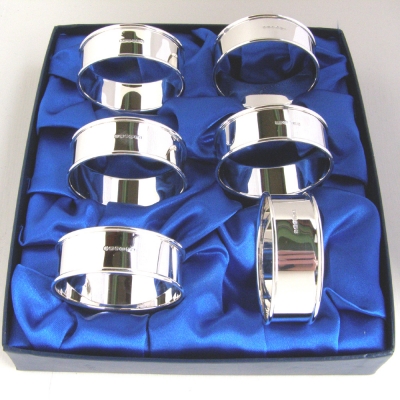 set of six boxed hallmarked sterling silver napkin rings