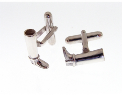 silver cufflinks with a horse riding boot theme